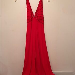 Formal Red Plunging V-Neck Prom Dress with Beaded Accents